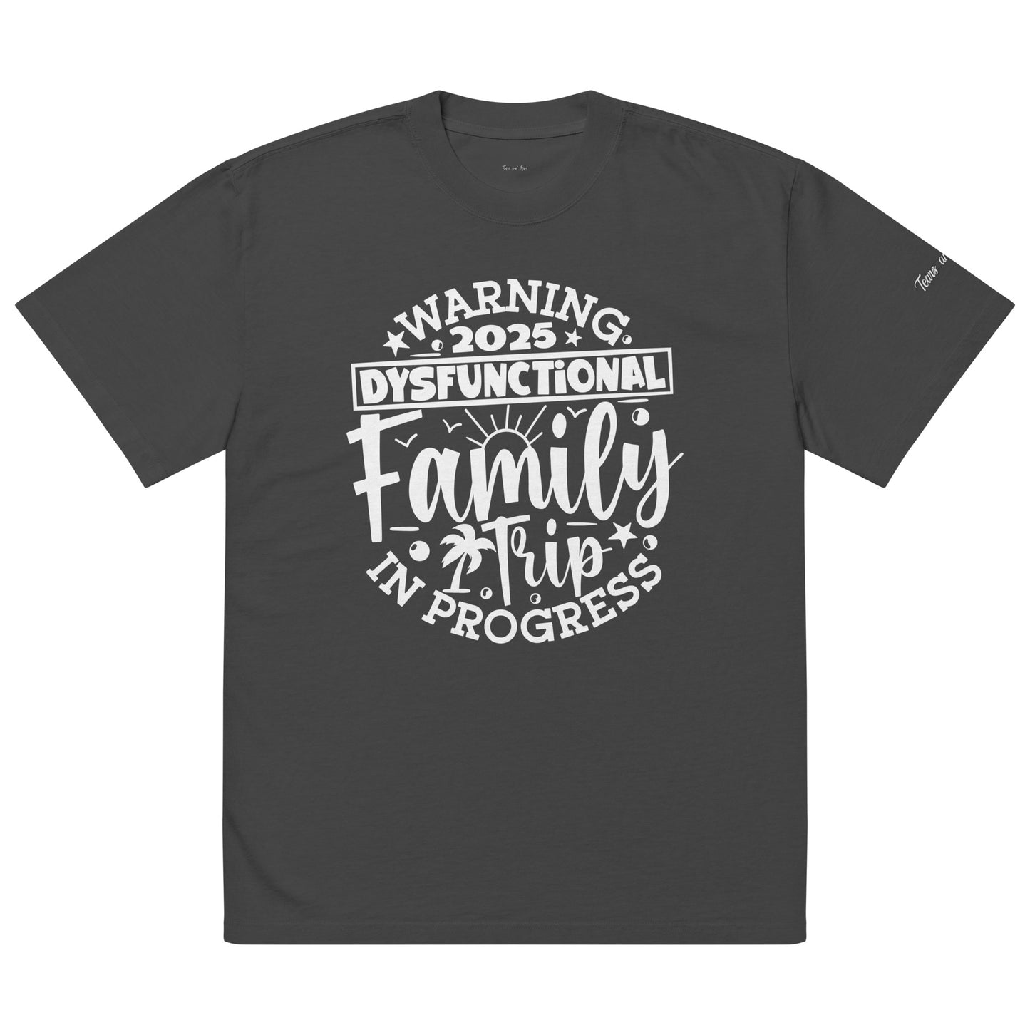 A t-shirt displaying the text "Warning: This is a Family in Progress" in bold letters on a light background.