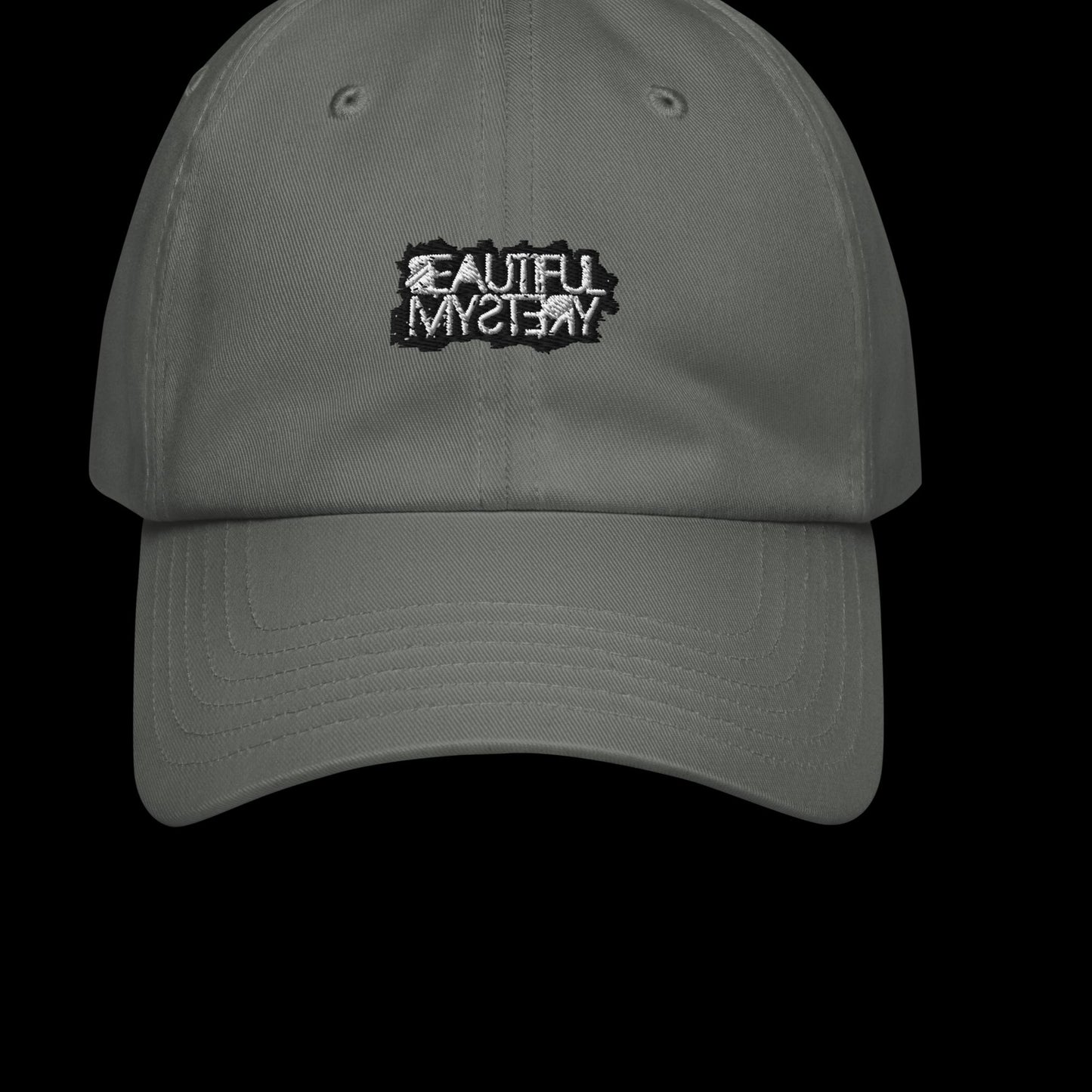 A grey hat featuring the words "Evil Mystery" prominently displayed on the front.
