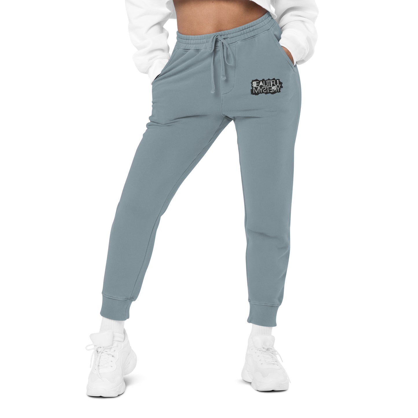 blue women's jogger pants featuring a white logo on the side, designed for comfort and casual wear.